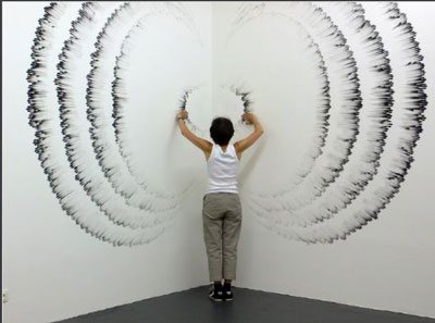Fingering #5 by Judith Braun, drawn on wall with fingers dipped in charcoal, 9 x 16, 2010.