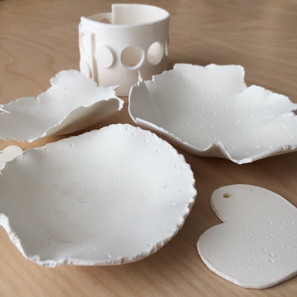 Set your DIY bowl aside to dry. I like to work on several pieces at a time, so while I had my clay out, I went ahead and shaped two more bowls, a couple of heart ornaments and a votive holder. Depending on the thickness of your clay, and the humidity of your environment, your bowl may be dry in as little as two hours or as long as overnight.