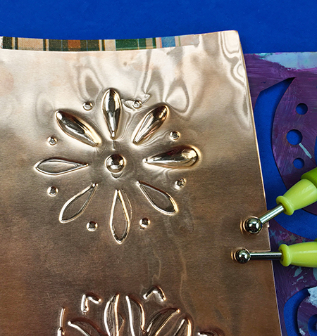 Creating dimension with metal embossing