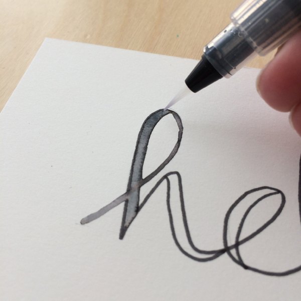 coloring inside lines with water brush for lettering