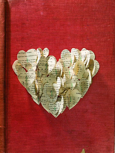 Collage created from a vintage book cover and pages, featured in Paper Art magazine