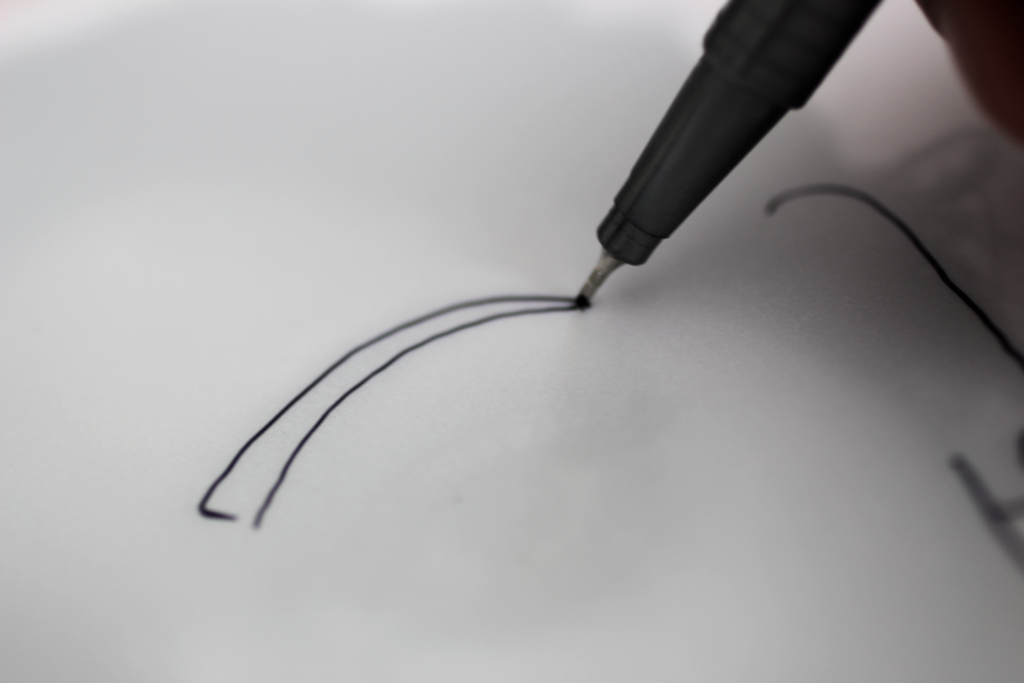 Scribble art I am outlining an eyebrow